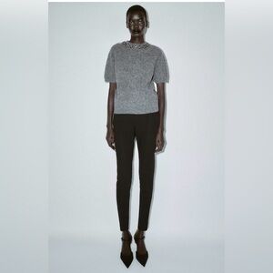 HIGH-WAISTED SLIM PANTS WITH ZIPPER HEM